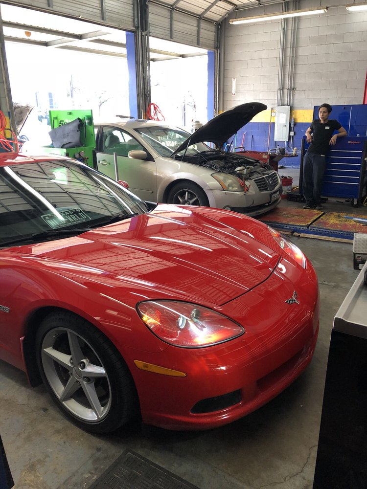Vehicles in service bay